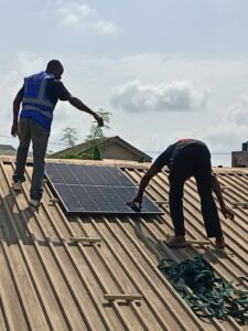 Tikado Energy Solutions team performing solar panel installation in Ajah.]